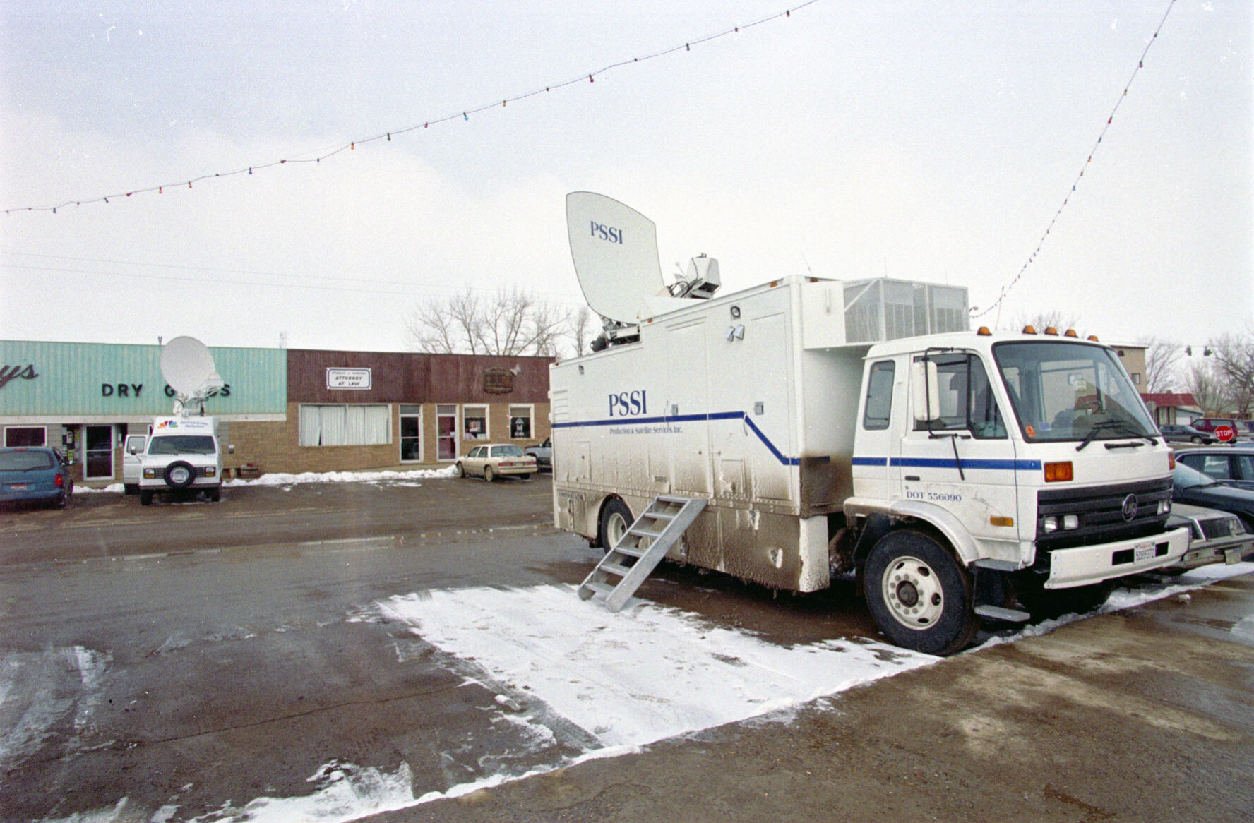 Broadcast vehicles in Jordan, March 31, 1996